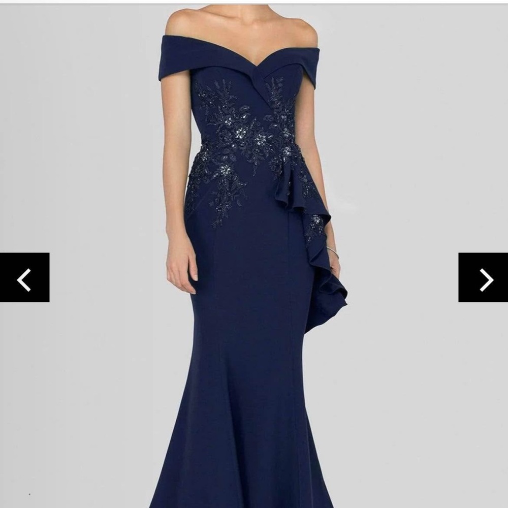 Blue asymmetrical embellished gown with ruffles